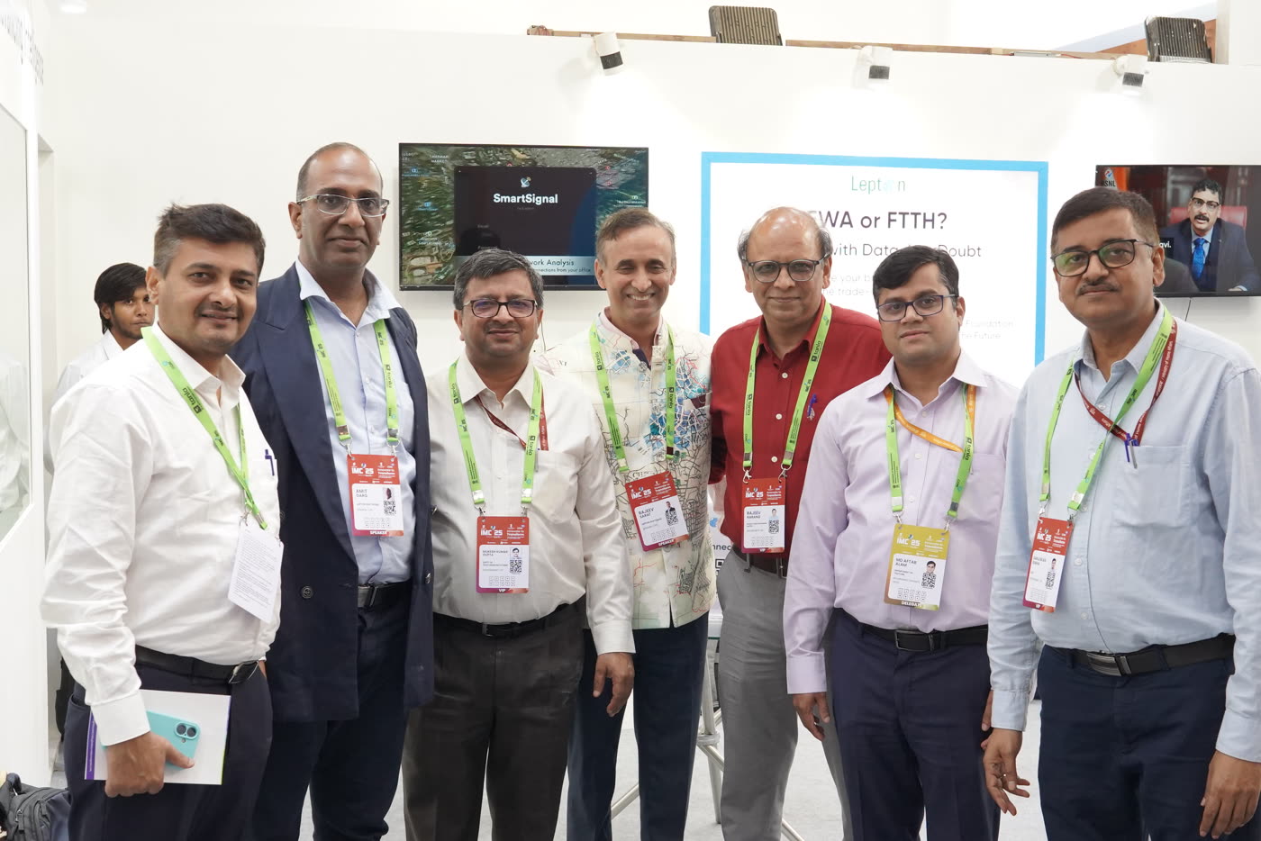 Lepton Software team and government delegates at the IMC 2025 booth