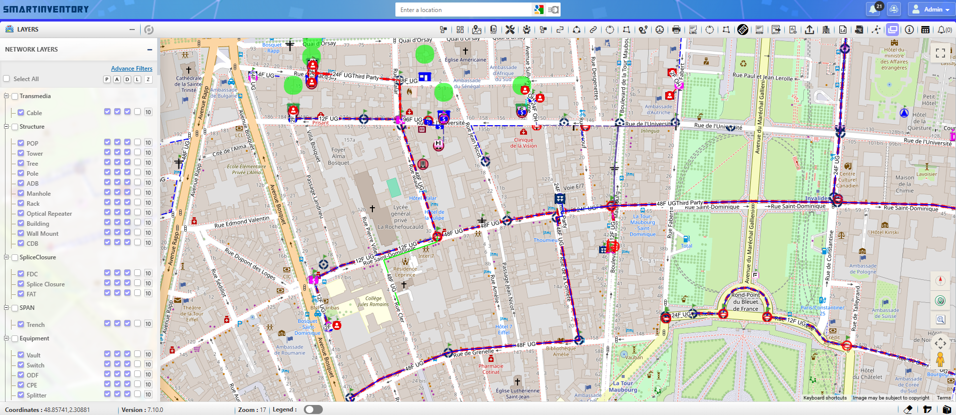 SmartInventory showing the live fiber plant across a dense city: cable spans labelled 12F to 96F, splice closures, poles and manholes over a street basemap